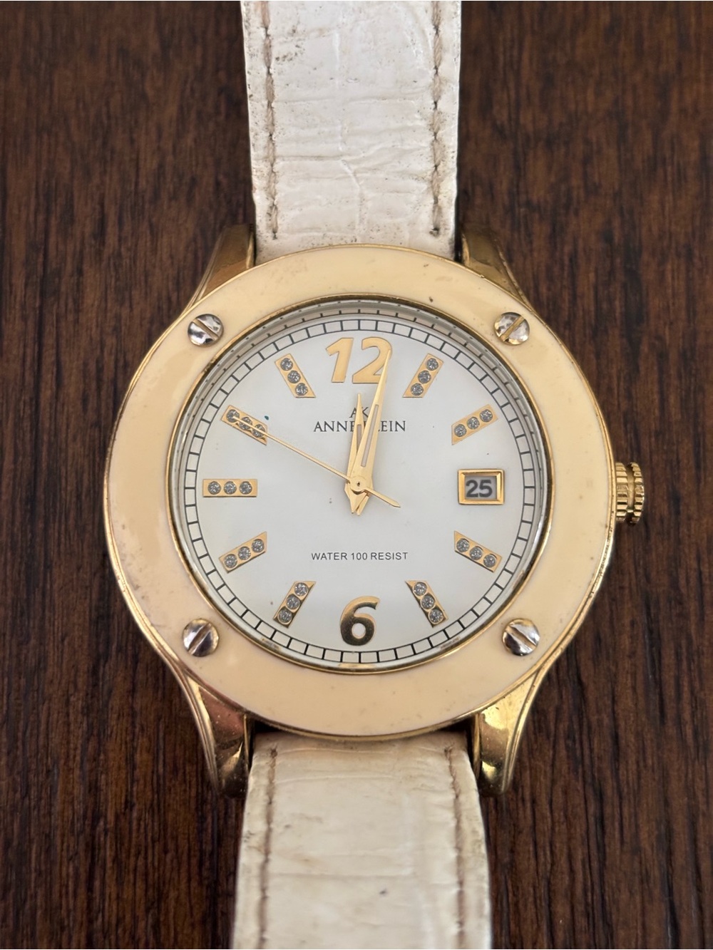Anne Klein Gold and White Leather Strap Crystal Accent Watch